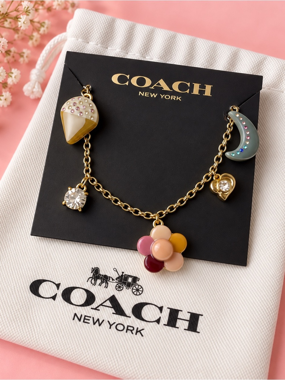Coach Gold-Tone Charm Bracelet with Pink, Yellow, White and Green Accents